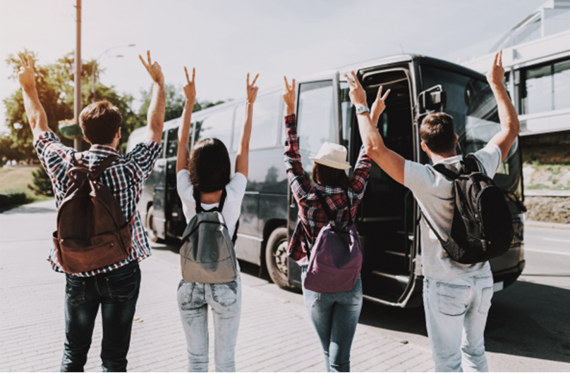 Traveler planning route with map and coffee